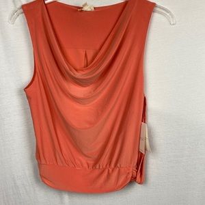 Orange top size L NWT! Orange with cute side design